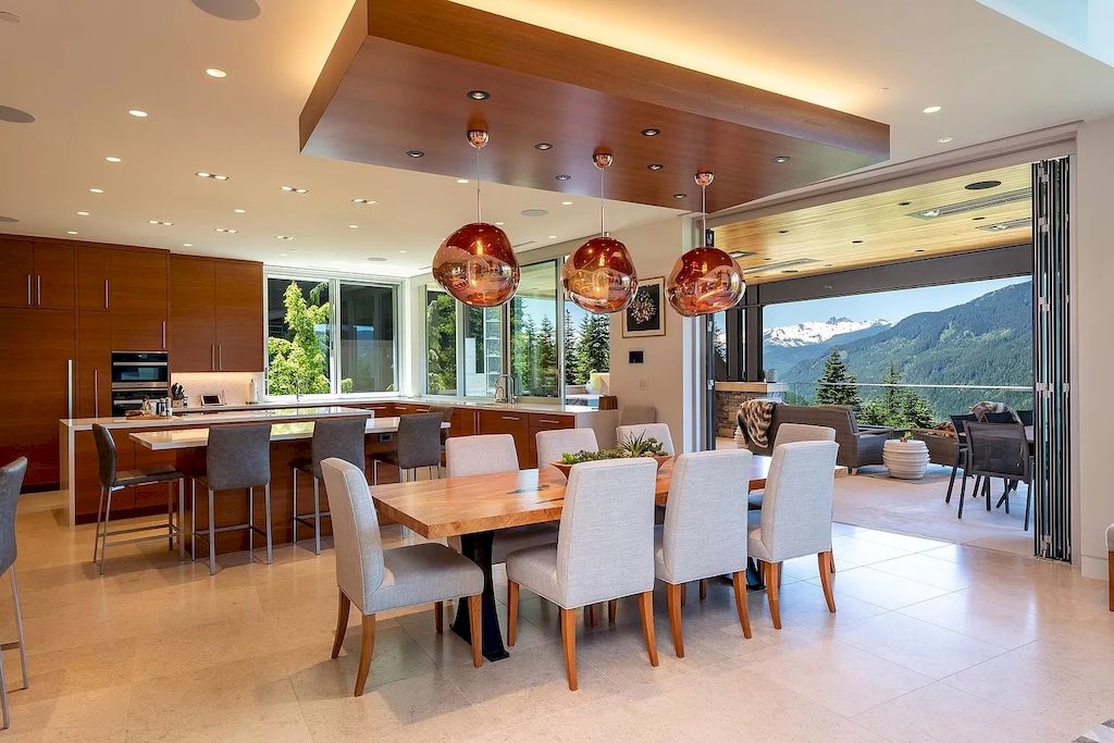The Home in Whistler has an open concept living room, dining room, kitchen & entertainment deck overlook stunning views now available for sale