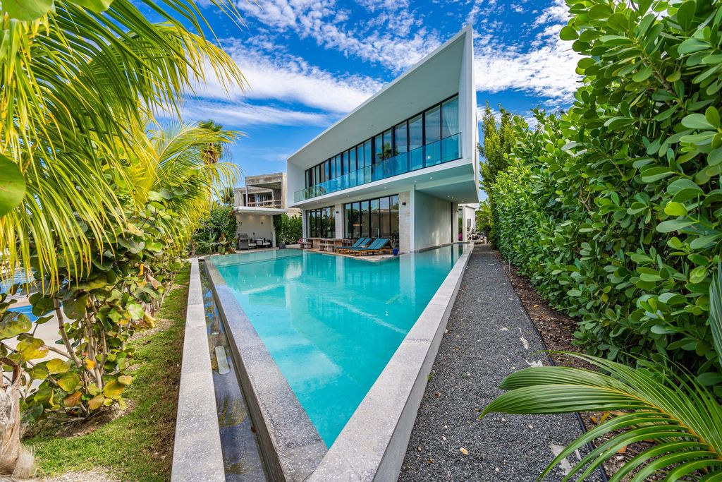 The Home in Miami Beach is a stunning new construction estate located on the prestigious and sought-after North Bay Road now available for sale. This house located at 3166 N Bay Rd, Miami Beach, Florida