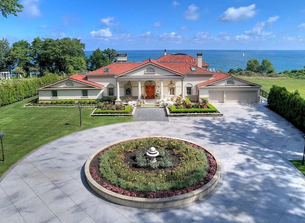 The Home in Ohio is a luxurious home offering unobstructed lake and city views now available for sale. This home located at 11518 Harbor View Dr, Cleveland, Ohio; offering 07 bedrooms and 10 bathrooms with 15,000 square feet of living spaces.