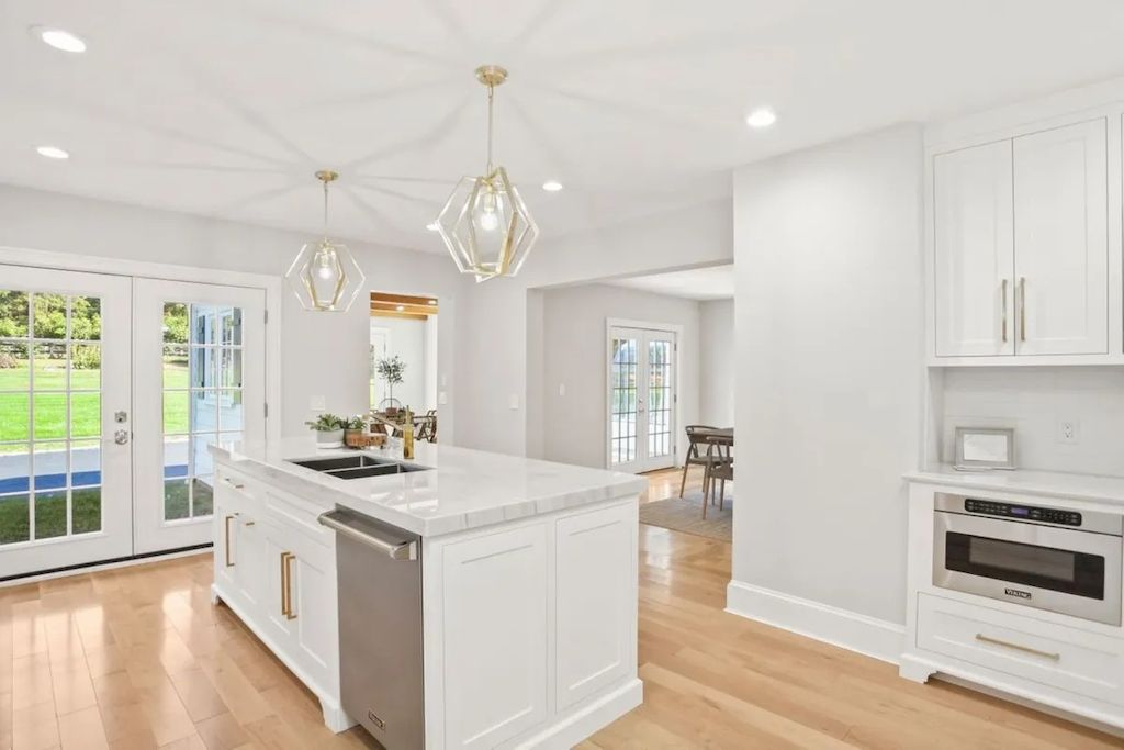 The Home in Connecticut is a luxurious home updated with an outdoor pool, a tennis court, a greenhouse and other amenities now available for sale. This home located at 849 Lake Ave, Greenwich, Connecticut; offering 05 bedrooms and 06 bathrooms with 5,221 square feet of living spaces.