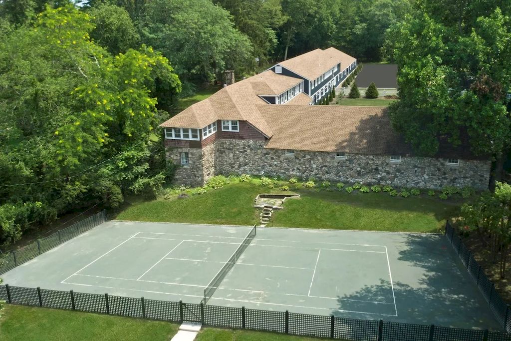 The Home in Connecticut is a luxurious home updated with an outdoor pool, a tennis court, a greenhouse and other amenities now available for sale. This home located at 849 Lake Ave, Greenwich, Connecticut; offering 05 bedrooms and 06 bathrooms with 5,221 square feet of living spaces.