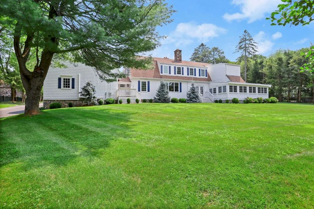 The Home in Connecticut is a luxurious home updated with an outdoor pool, a tennis court, a greenhouse and other amenities now available for sale. This home located at 849 Lake Ave, Greenwich, Connecticut; offering 05 bedrooms and 06 bathrooms with 5,221 square feet of living spaces.