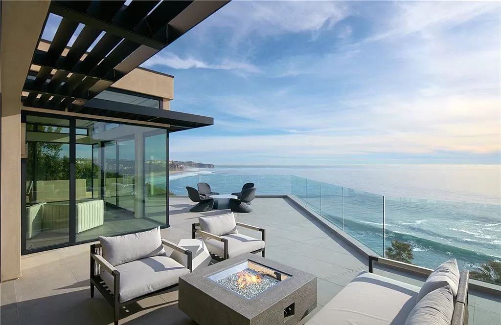 The Home in Dana Point is a contemporary oceanfront estate has been completely reimagined, expanded, and enhanced in exacting standards now available for sale. This home located at 63 Monarch Bay Dr, Dana Point, California