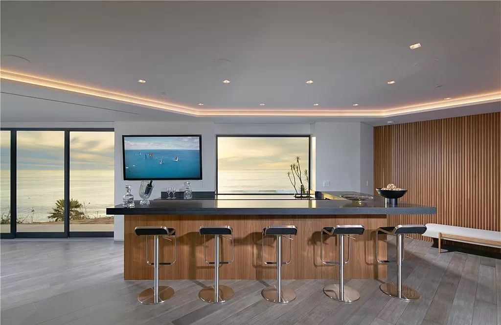 The Home in Dana Point is a contemporary oceanfront estate has been completely reimagined, expanded, and enhanced in exacting standards now available for sale. This home located at 63 Monarch Bay Dr, Dana Point, California