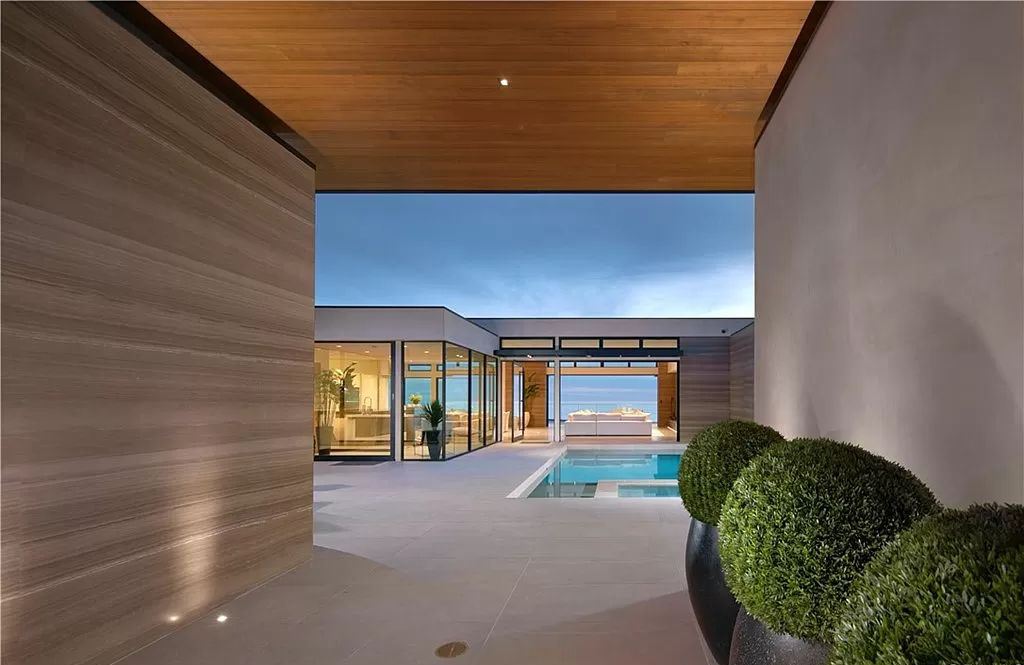 The Home in Dana Point is a contemporary oceanfront estate has been completely reimagined, expanded, and enhanced in exacting standards now available for sale. This home located at 63 Monarch Bay Dr, Dana Point, California