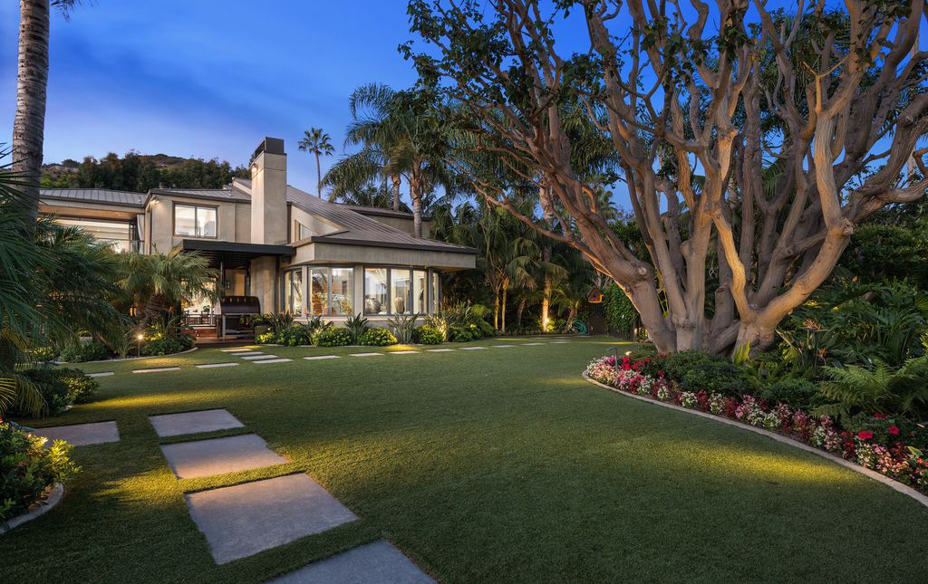 The Home in Malibu is a beautiful architectural sits behind gates on over an acre of tropical, resort like paradise now available for sale. This home located at 27033 Sea Vista Dr, Malibu, California