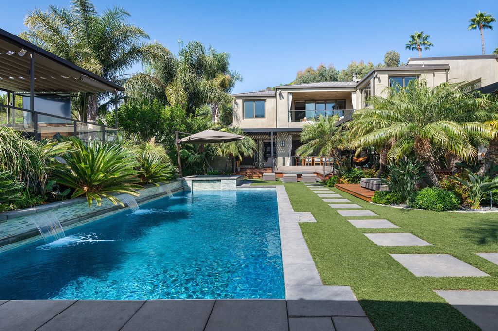 The Home in Malibu is a beautiful architectural sits behind gates on over an acre of tropical, resort like paradise now available for sale. This home located at 27033 Sea Vista Dr, Malibu, California
