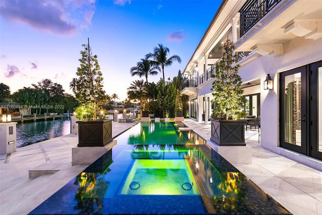 The Mansion in Fort Lauderdale is a timelessly designed home featuring a grand double height entryway and a thoughtful floorplan now available for sale. This home located at 2436 Aqua Vista Blvd, Fort Lauderdale, Florida