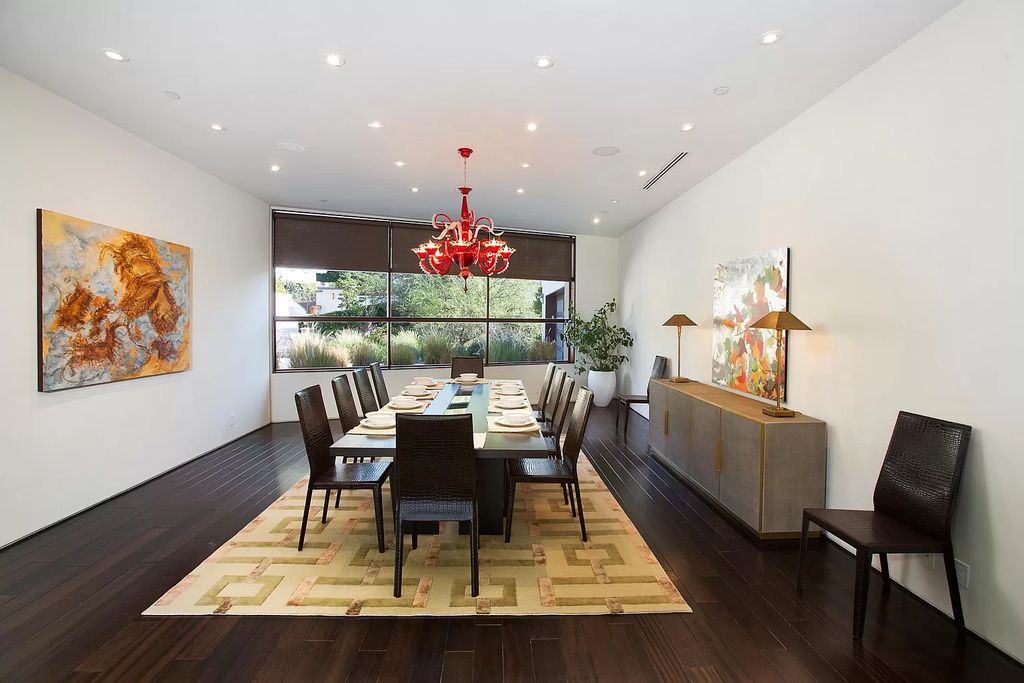 The Home in Beverly Hills is a comfortable contemporary estate perched atop exclusive Trousdale neighborhood now available for rent. This house located at 455 Castle Pl, Beverly Hills, California