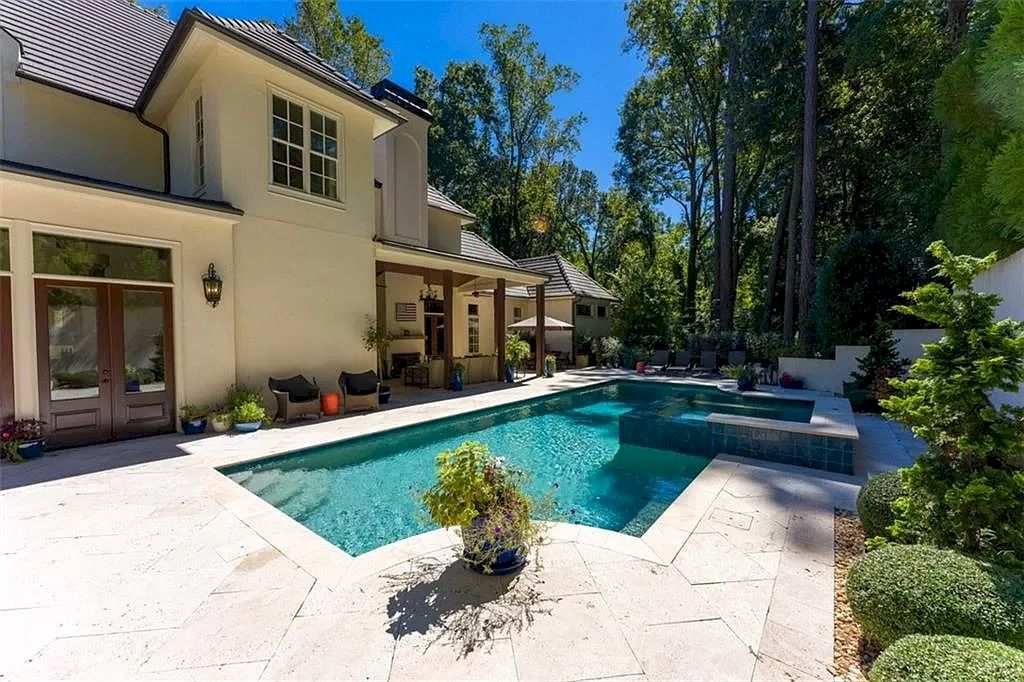 The Home in Georgia is a luxurious, impressive and well-built home now available for sale. This home located at 4150 Beechwood Dr NW, Atlanta, Georgia; offering 05 bedrooms and 07 bathrooms with 7,400 square feet of living spaces.