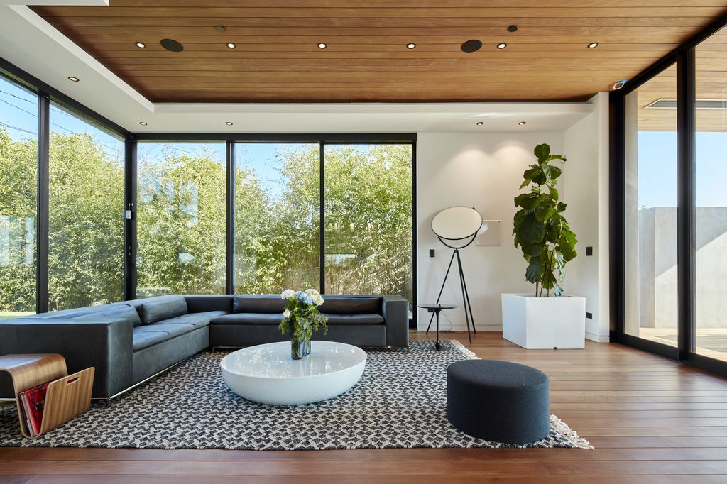 The Home in Santa Monica is a custom residence showcases bold design while encompassing warmth through its alluring architecture now available for sale. This house located at 837 Berkeley St, Santa Monica, California