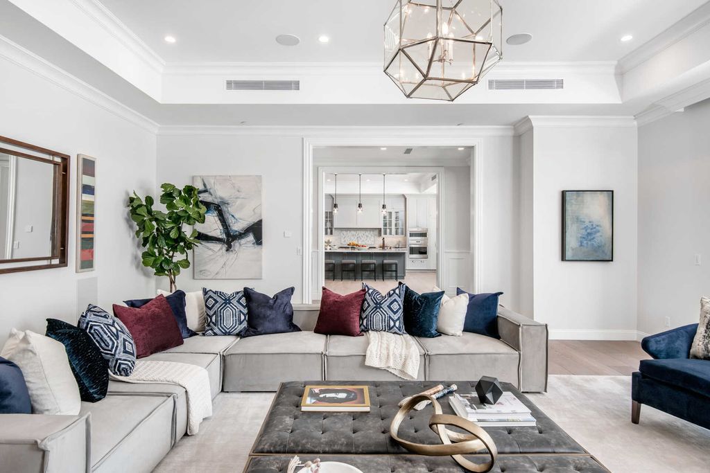 The Home in Encino is an exquisite new construction estate with a spacious great room, a home theater with 12 automatic chairs and more now available for sale. This home located at 4509 Noeline Ave, Encino, California