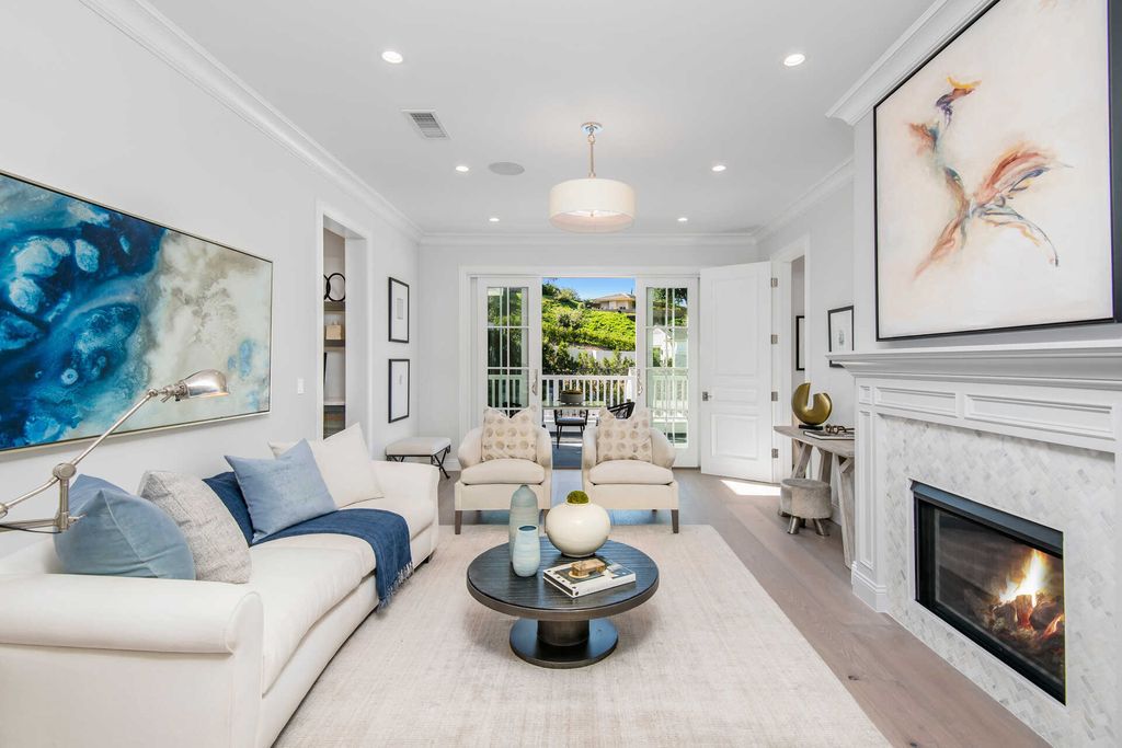 The Home in Encino is an exquisite new construction estate with a spacious great room, a home theater with 12 automatic chairs and more now available for sale. This home located at 4509 Noeline Ave, Encino, California