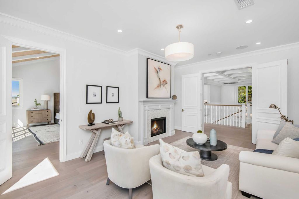 The Home in Encino is an exquisite new construction estate with a spacious great room, a home theater with 12 automatic chairs and more now available for sale. This home located at 4509 Noeline Ave, Encino, California