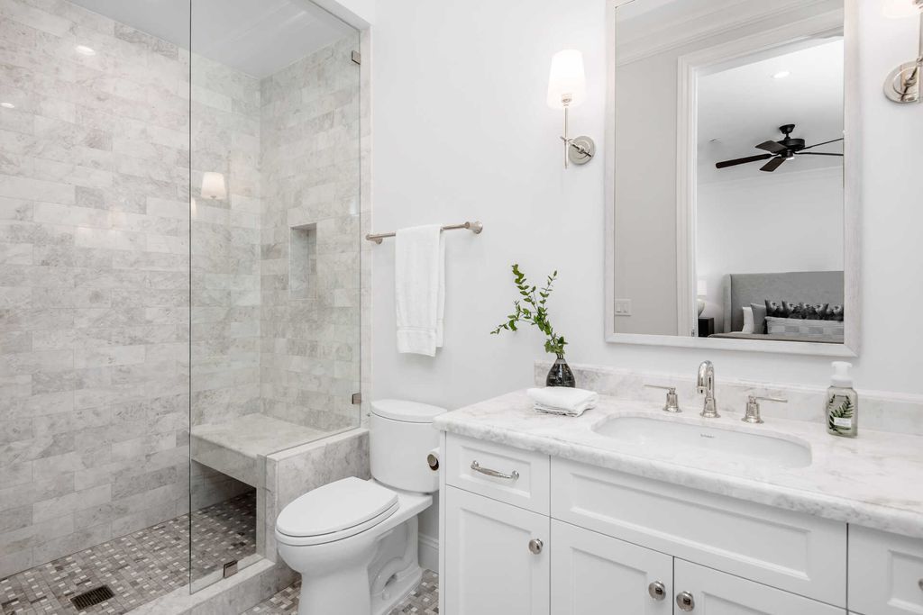While monochrome bathrooms may seem boring, using unique materials can help create a sense of depth and interest in a small space. For example, consider using tiles with varying textures or patterns to add visual interest to your shower or backsplash. Additionally, using natural materials like stone or wood can add warmth and texture to an otherwise monochromatic space. By incorporating unique materials into your monochrome bathroom, you can create a more dynamic and visually appealing space that still feels cohesive and streamlined.