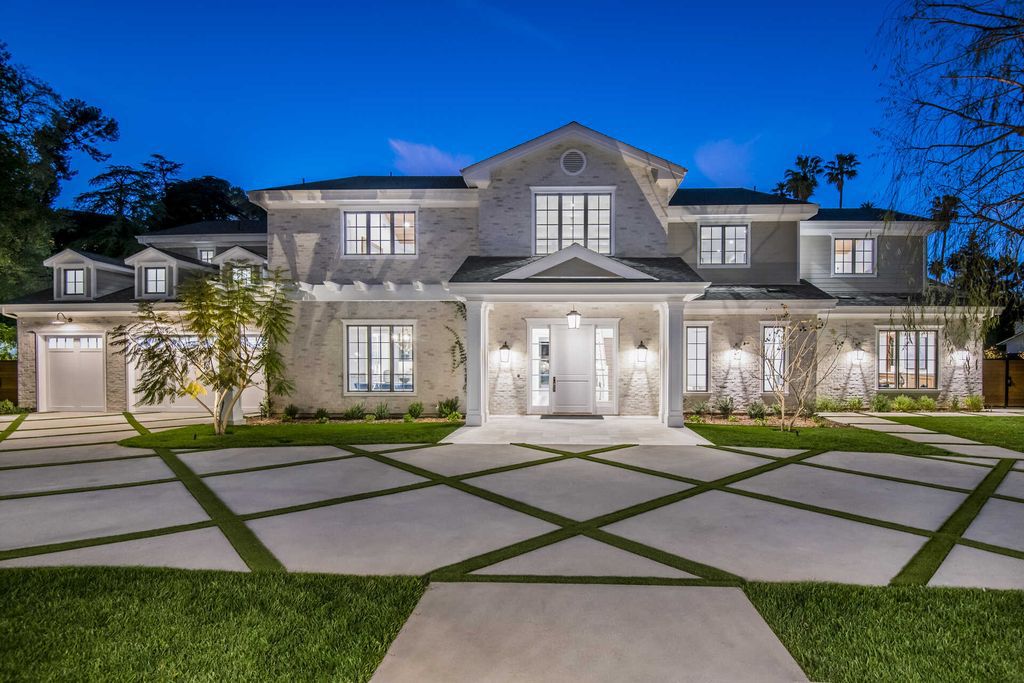 The Home in Encino is an exquisite new construction estate with a spacious great room, a home theater with 12 automatic chairs and more now available for sale. This home located at 4509 Noeline Ave, Encino, California