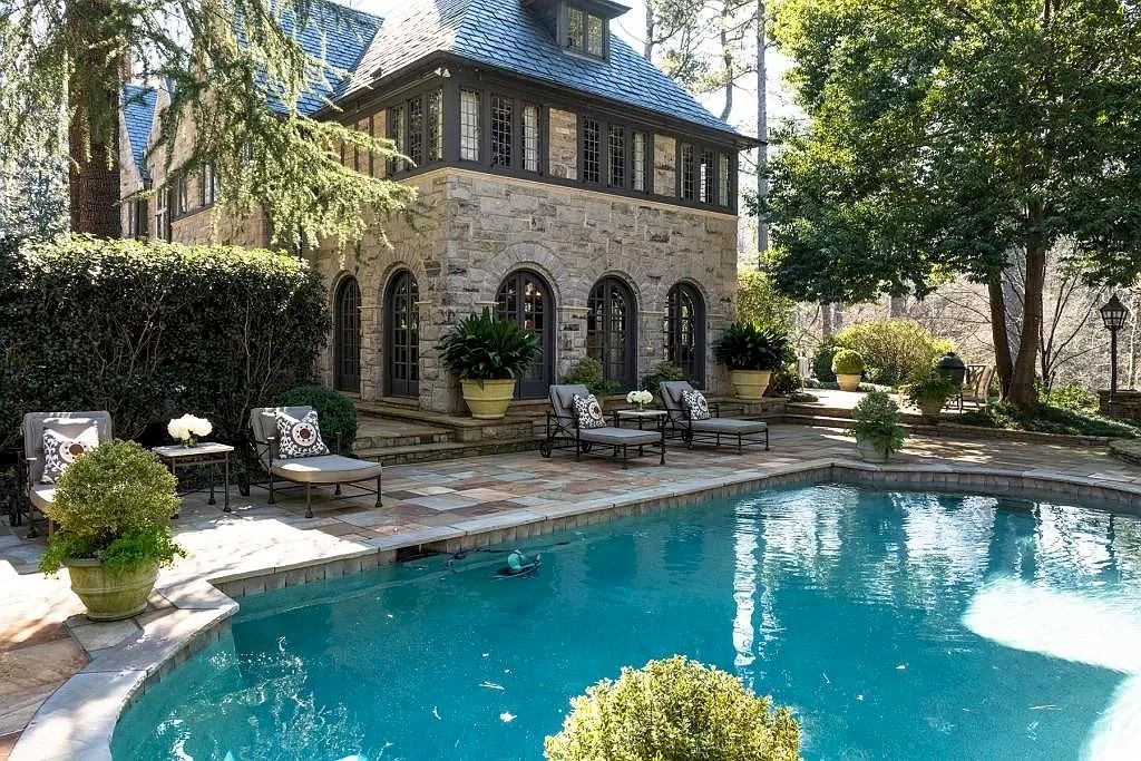 The Home in Georgia is a luxurious home designed with entertaining purposes now available for sale. This home located at 3015 Andrews Dr NW, Atlanta, Georgia; offering 05 bedrooms and 08 bathrooms with 6,825 square feet of living spaces. 