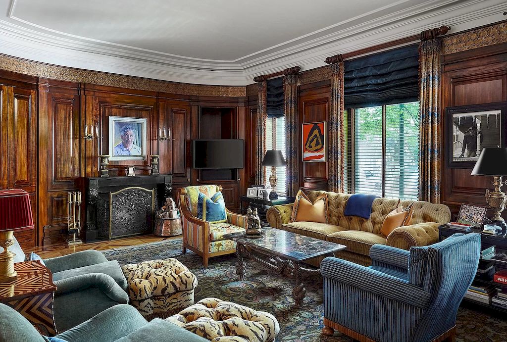 This room is a masterwork of proportion and balance, with contemporary furniture removing the dust from the home's attractive historic features and adding the occasional surprise. Despite the fact that this living room was added in the latter 1800s, it still has some Arts and Crafts elements. 