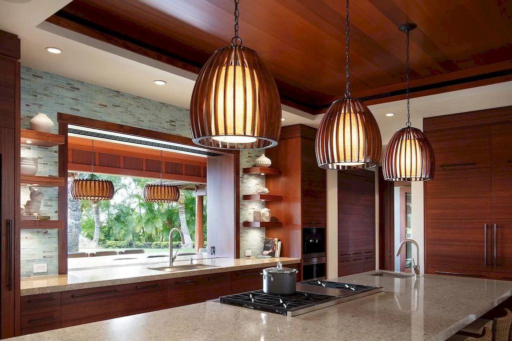 The Home in Hawaii is a luxurious home featuring seamless indoor-outdoor contemporary design now available for sale. This home located at 26 Ualei Pl, Kihei, Hawaii; offering 05 bedrooms and 06 bathrooms with 4,383 square feet of living spaces.