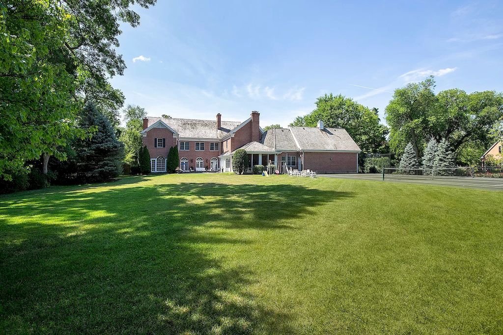 The Home in Illinois is a luxurious home built in 2005 with exquisite millwork, spacious rooms and high ceilings now available for sale. This home located at 27 Indian Hill Rd, Winnetka, Illinois; offering 06 bedrooms and 08 bathrooms with 8,800 square feet of living spaces. 