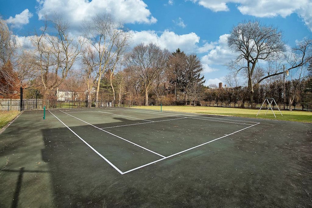 The Home in Illinois is a luxurious home built in 2005 with exquisite millwork, spacious rooms and high ceilings now available for sale. This home located at 27 Indian Hill Rd, Winnetka, Illinois; offering 06 bedrooms and 08 bathrooms with 8,800 square feet of living spaces. 