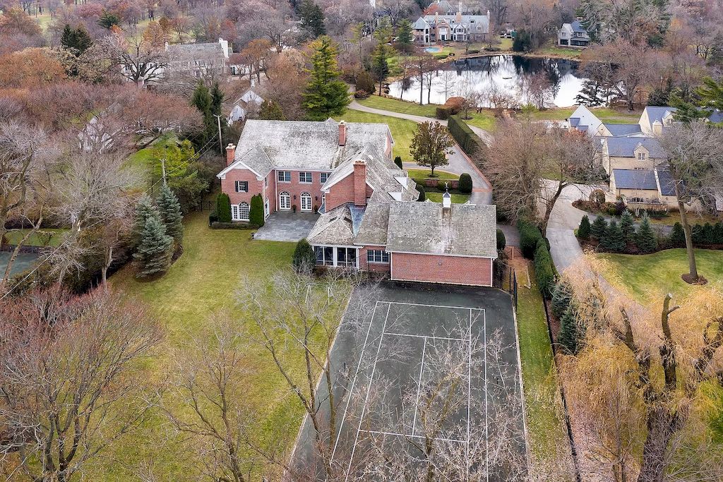 The Home in Illinois is a luxurious home built in 2005 with exquisite millwork, spacious rooms and high ceilings now available for sale. This home located at 27 Indian Hill Rd, Winnetka, Illinois; offering 06 bedrooms and 08 bathrooms with 8,800 square feet of living spaces. 