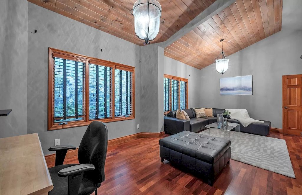 The Villa in West Vancouver offers a main level including gourmet kitchen, wine cellar, open space to the patio with hand painted tiles, interior swimming pool, hot tub now available for sale