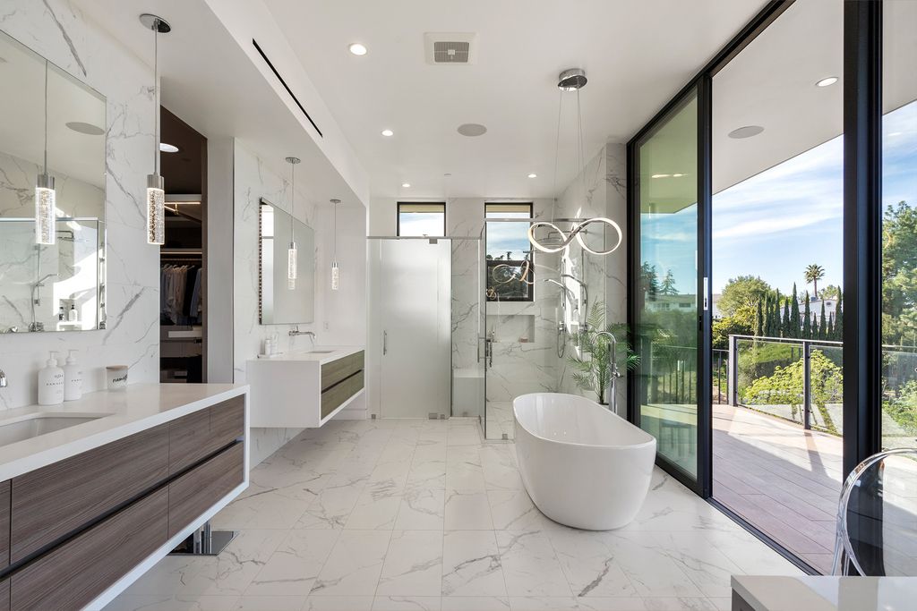 The Home in Sherman Oaks is a recently built modern masterpiece with unobstructed views of the city and mountains now available for sale. This home located at 3369 Alana Dr, Sherman Oaks, California;