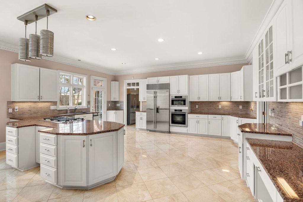 The Home in Virginia is a luxurious home conveniently located just minutes to Washington, DC now available for sale. This home located at 6832 Georgetown Pike, McLean, Virginia; offering 10 bedrooms and 13 bathrooms with 16,243 square feet of living spaces. 