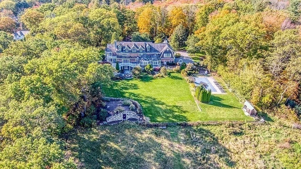 The Home in Massachusetts is a luxurious home featuring professional landscaping with mature plantings, trees and gardens now available for sale. This home located at 1266 Monument St, Concord, Massachusetts; offering 06 bedrooms and 08 bathrooms with 9,849 square feet of living spaces.