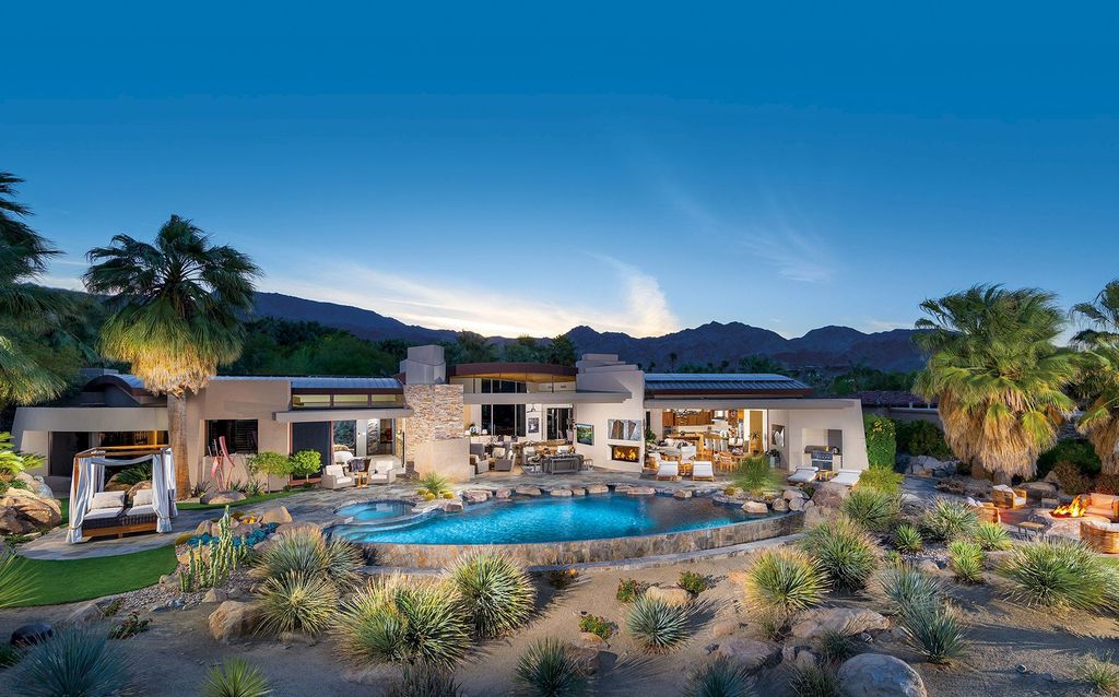 The Home in Palm Desert is One-of-a-kind estate has an unequalled outdoor living with two fireplaces and infinity-edge pool now available for sale. This home located at 964 Andreas Canyon Dr, Palm Desert, California