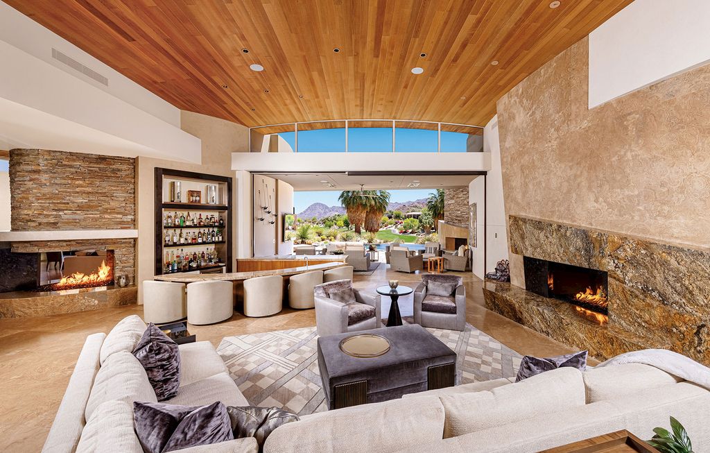 The Home in Palm Desert is One-of-a-kind estate has an unequalled outdoor living with two fireplaces and infinity-edge pool now available for sale. This home located at 964 Andreas Canyon Dr, Palm Desert, California