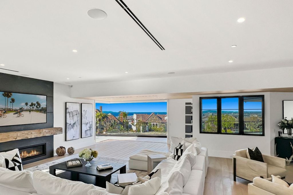 The Home in Newport Beach is a remarkable newly constructed modern estate perched high in the guard gated community of Harbor Ridge now available for sale. This home located at 4 San Sebastian, Newport Beach, California
