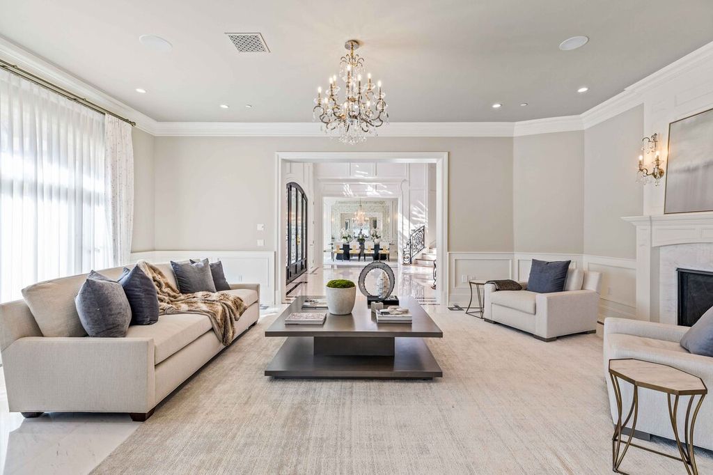 The French Estate in Arcadia is an exquisitely renovated masterpiece in a coveted street in Upper Rancho now available for sale. This home located at 911 Hampton Rd, Arcadia, California