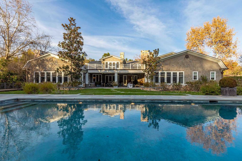 The Home in Hidden Hills is a stunning Dutch Colonial with outdoor kitchen make for the ultimate in estate living now available for sale. This home located at 23870 Long Valley Rd, Hidden Hills, California;
