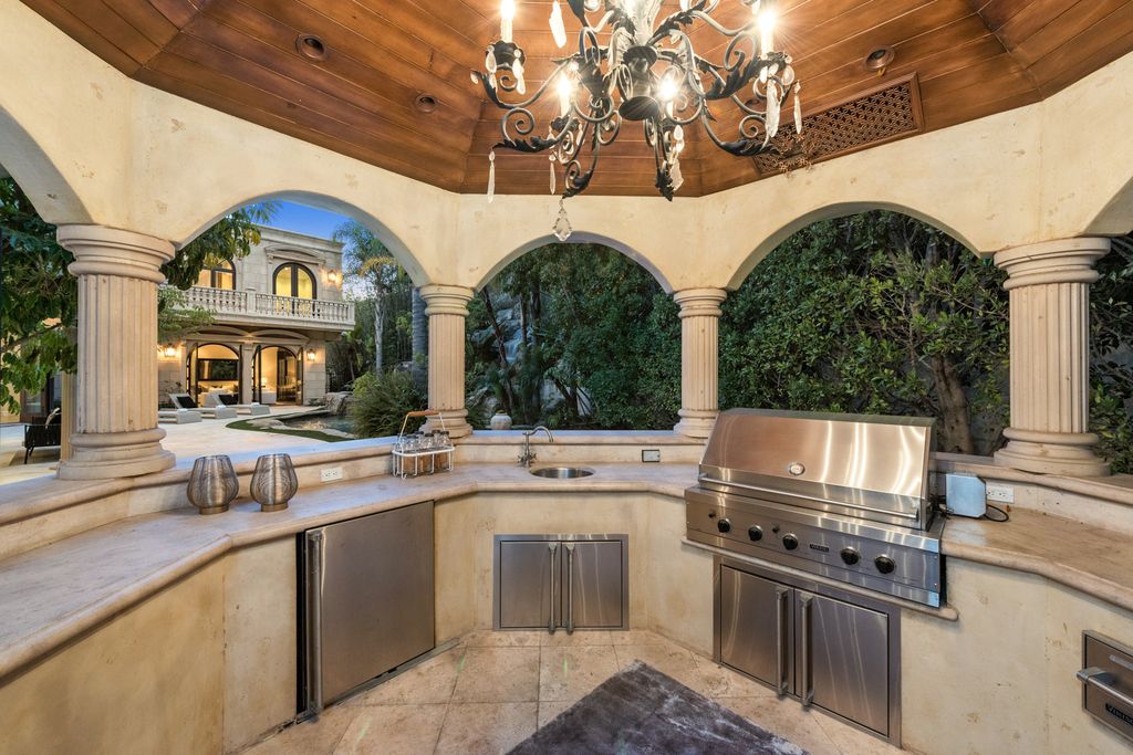 The Villa in Beverly Hills is a Mediterranean Estate boasts 9,370 square feet of unmatched grandeur and scale now available for sale. This home located at 1181 Laurel Way, Beverly Hills, California