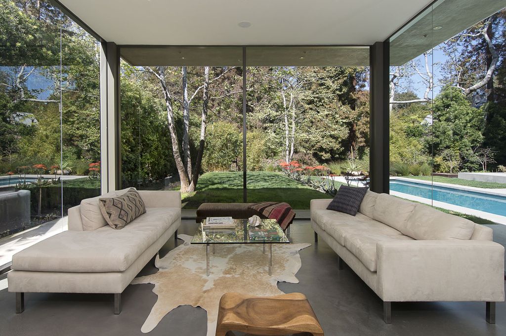 The Home in Santa Monica is an exceptionally well designed estate on an expansive private, serene lot now available for sale. This home located at 671 Latimer Rd, Santa Monica, California