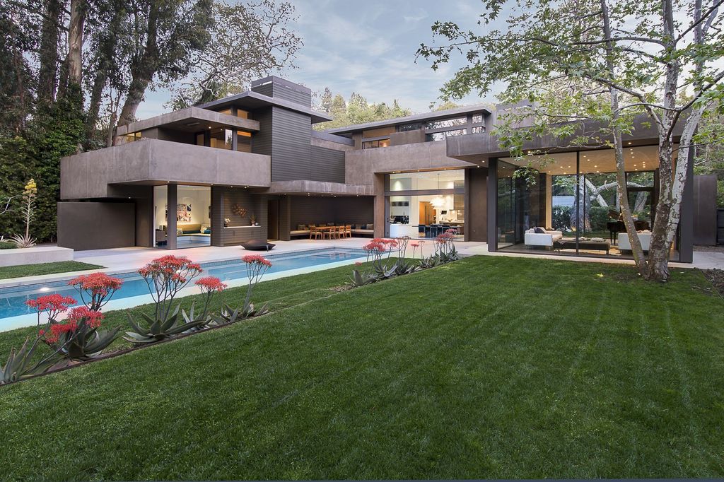 The Home in Santa Monica is an exceptionally well designed estate on an expansive private, serene lot now available for sale. This home located at 671 Latimer Rd, Santa Monica, California