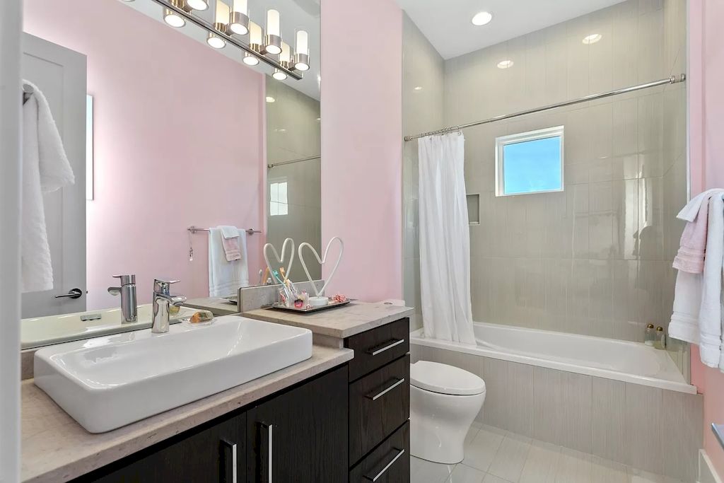 Using baby pink wall paint is a great way to bring sweetness, and youthfulness into your bathroom. Especially with the priority designs using gray tones for most of the bathroom's interior, from cabinets, floor tiles, or bath splash. There are many pink tones for you to choose in this case. But for the bathroom with a small area and you love the minimalist style, the bright pink tones are still the first choice. Or if you choose the break, you can also change the color arrangement on it.