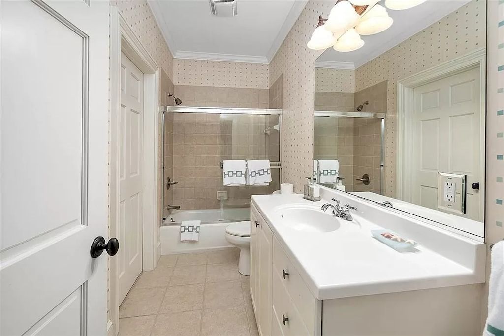If you're lucky enough to have a shower in your small bathroom, adding a shower bench can be a game-changer. Not only does it provide a spot to sit and relax, but it can also be customized to fit your specific needs. For example, if you have mobility issues, consider installing a bench that is wider or at a lower height. Additionally, consider adding shelves or hooks to the bench to store towels or other shower essentials. By customizing your shower bench, you can make the most of your space and create a more comfortable and functional bathroom experience.
