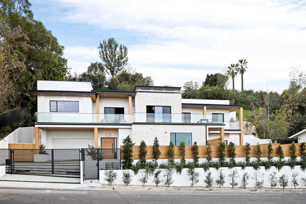 The Home in Studio City is a gated contemporary masterpiece offers sophisticated design and magnificent valley views now available for sale. This home located at 11258 Laurie Dr, Studio City, California