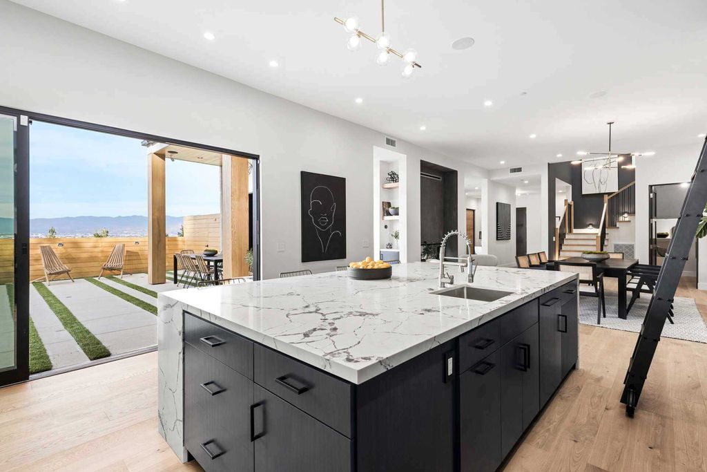 The Home in Studio City is a gated contemporary masterpiece offers sophisticated design and magnificent valley views now available for sale. This home located at 11258 Laurie Dr, Studio City, California