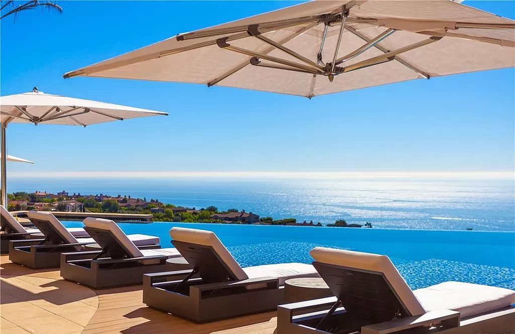 The Home in Newport is an unique property showcases sweeping unobstructed ocean views, superior construction, and meticulous detail now available for sale. This home located at 46 Deep Sea, Newport Coast, California