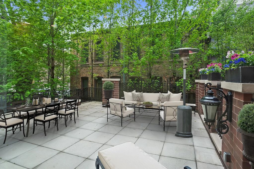 The Home in Illinois is a luxurious home with a richly landscaped mature garden and pool now available for sale. This home located at 1844 N Burling St, Chicago, Illinois; offering 05 bedrooms and 06 bathrooms with 3,145 square feet of land. 