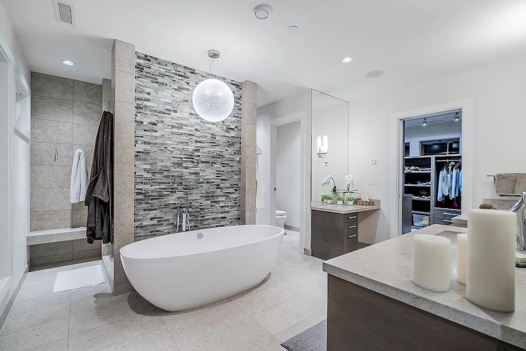 If you're looking for ways to elevate the style of your gray bathroom, consider using glass accents. Glass accents can add a touch of elegance and sophistication to your bathroom while also creating a sense of spaciousness. You can use glass in a variety of ways, from shower doors and partitions to shelves and decorative accents. 