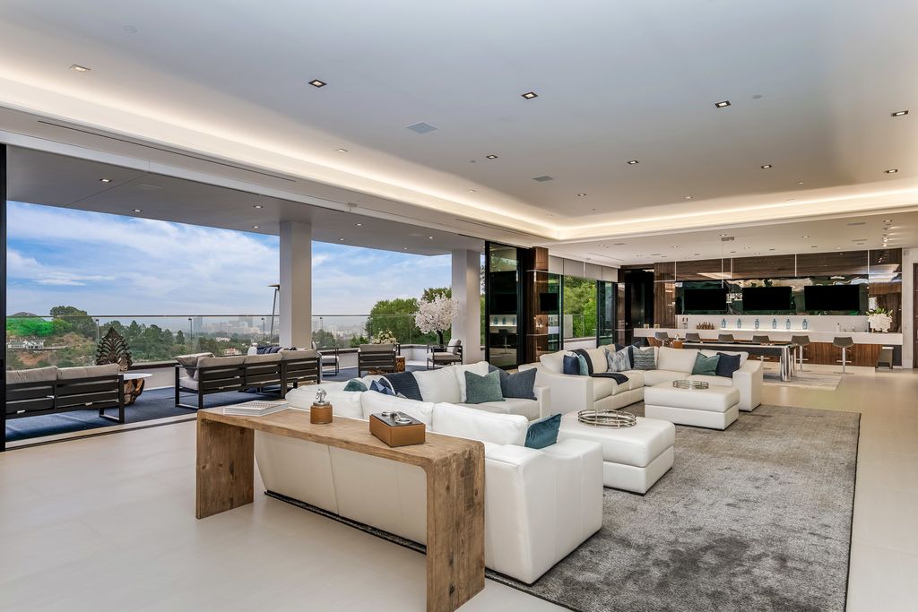 The Mansion in Bel Air is a modern masterpiece that raises the bar for ultimate luxury, located through the Bel Air West Gate now available for sale. This home located at 10979 Chalon Rd, Los Angeles, California
