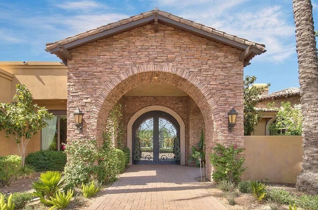 This $9,500,000 Home in Arizona offers a magnificent mixture of grass and desert landscaping