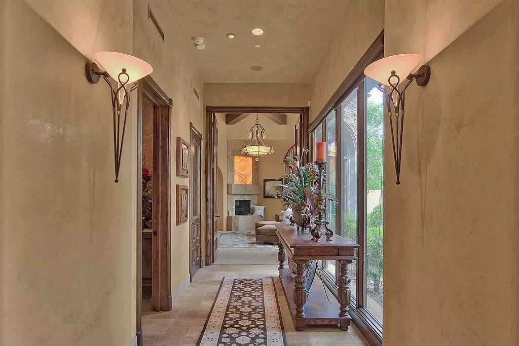 This $9,500,000 Home in Arizona offers a magnificent mixture of grass and desert landscaping