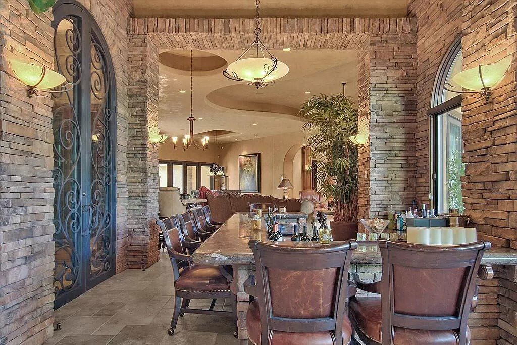 This $9,500,000 Home in Arizona offers a magnificent mixture of grass and desert landscaping