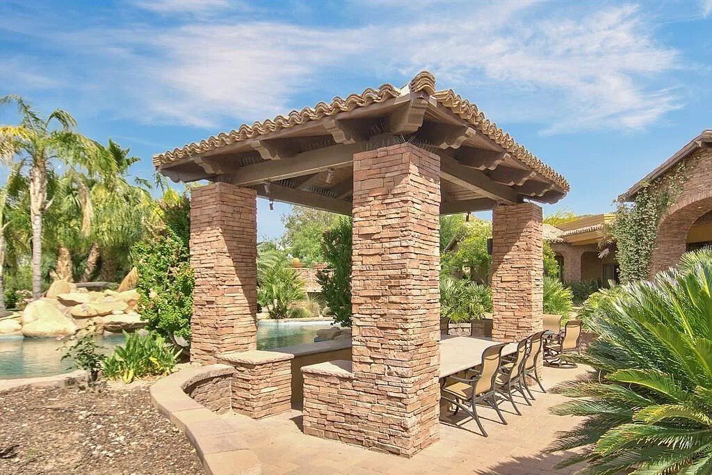 This $9,500,000 Home in Arizona offers a magnificent mixture of grass and desert landscaping